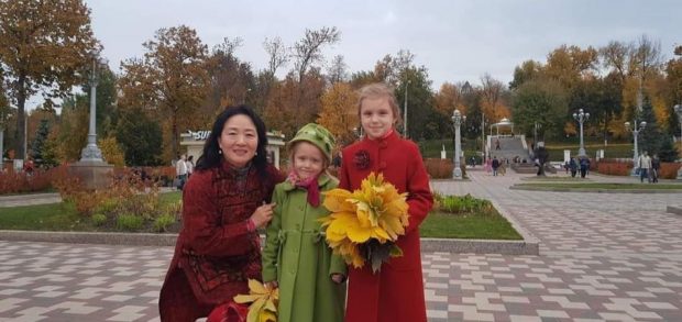  Cherry is with Russian children in a Samara’s park in Russia